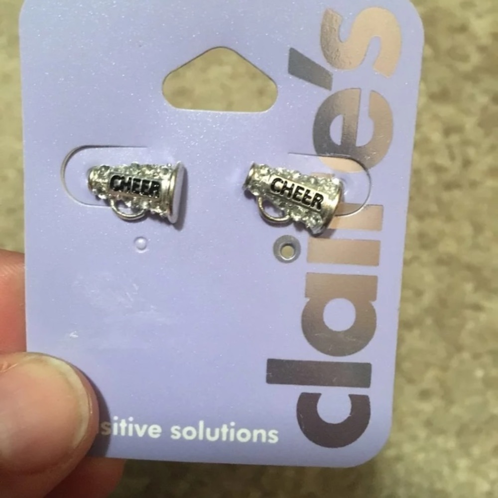 Cheerleading megaphone earrings: from Claire’s